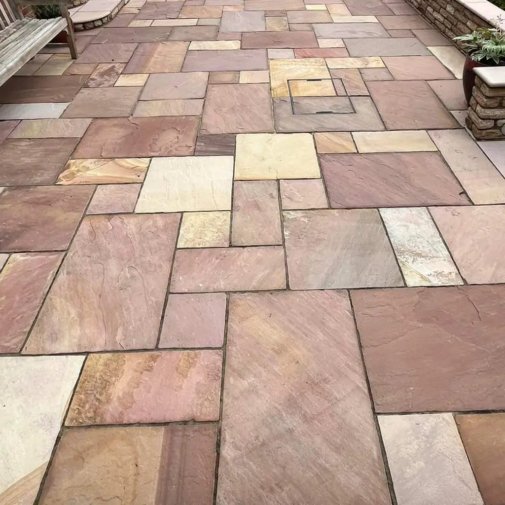 Natural stone patio pavement which has been pressure washed and cleaned