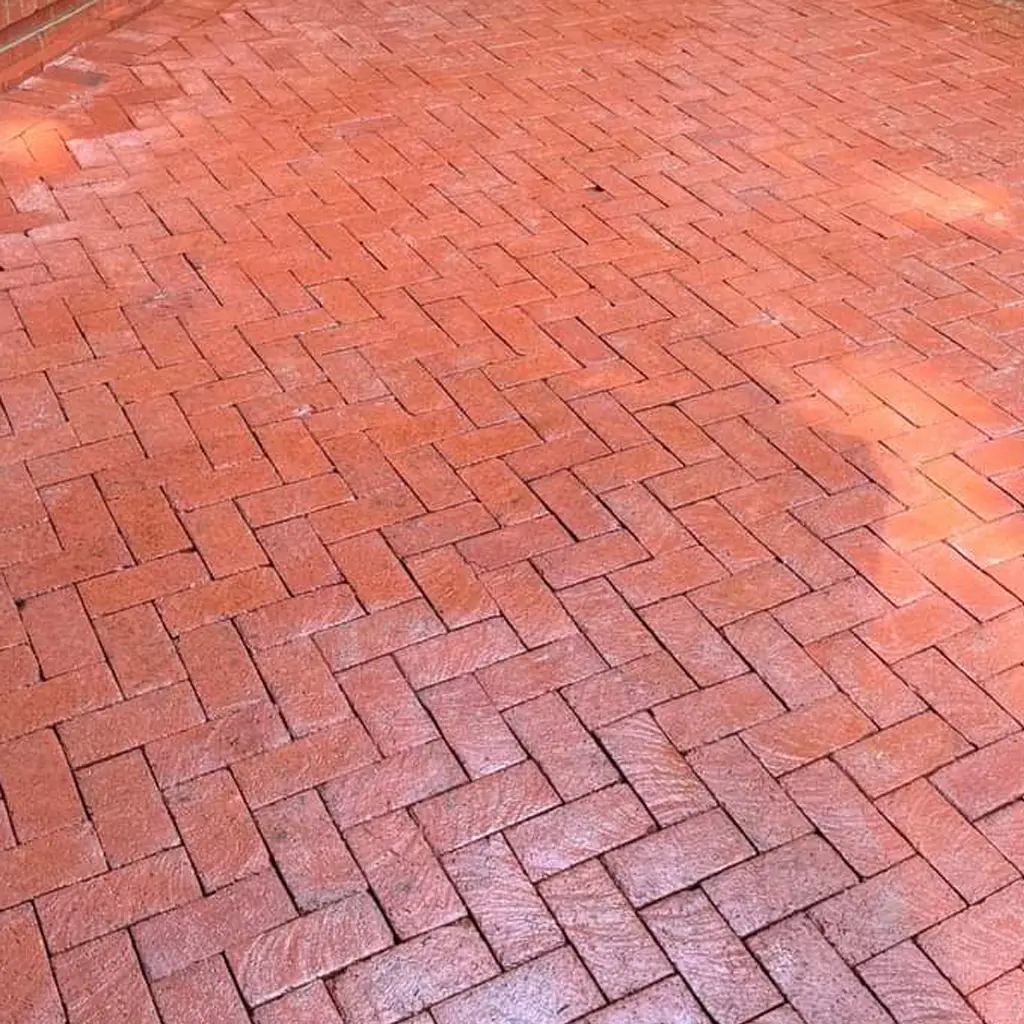 Red brick pavers that have been pressure washed and sealed in Stirling